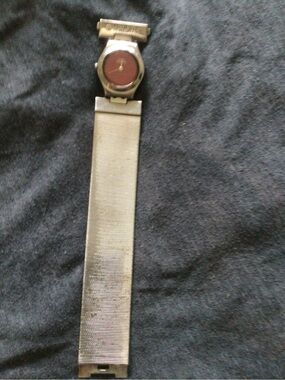 Swatch silver mesh band watch with red dial